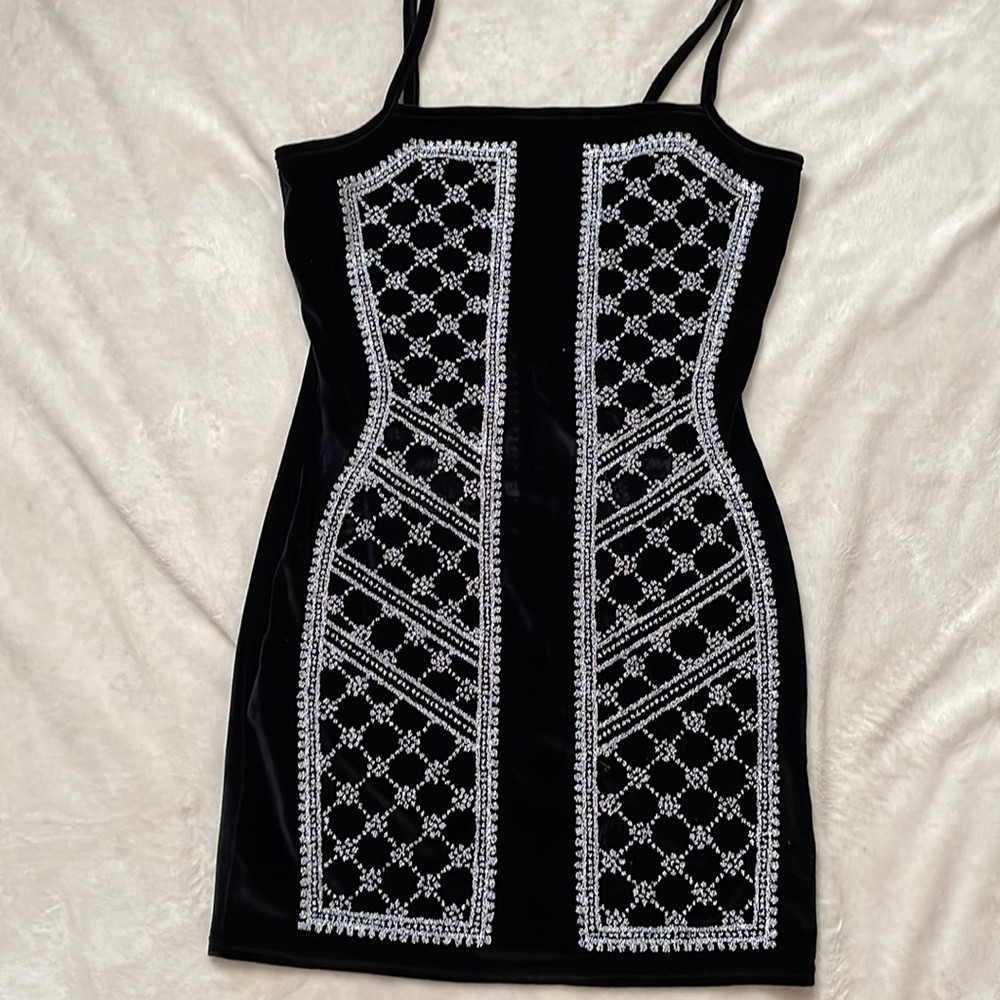 Black velvet with silver embroiled